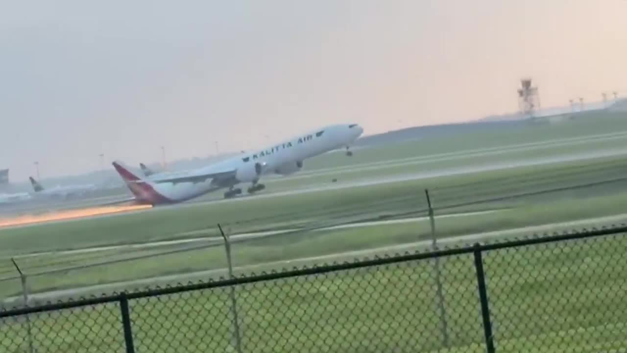 Sparks fly as video shows cargo plane go into tail skid during aborted landing attempt