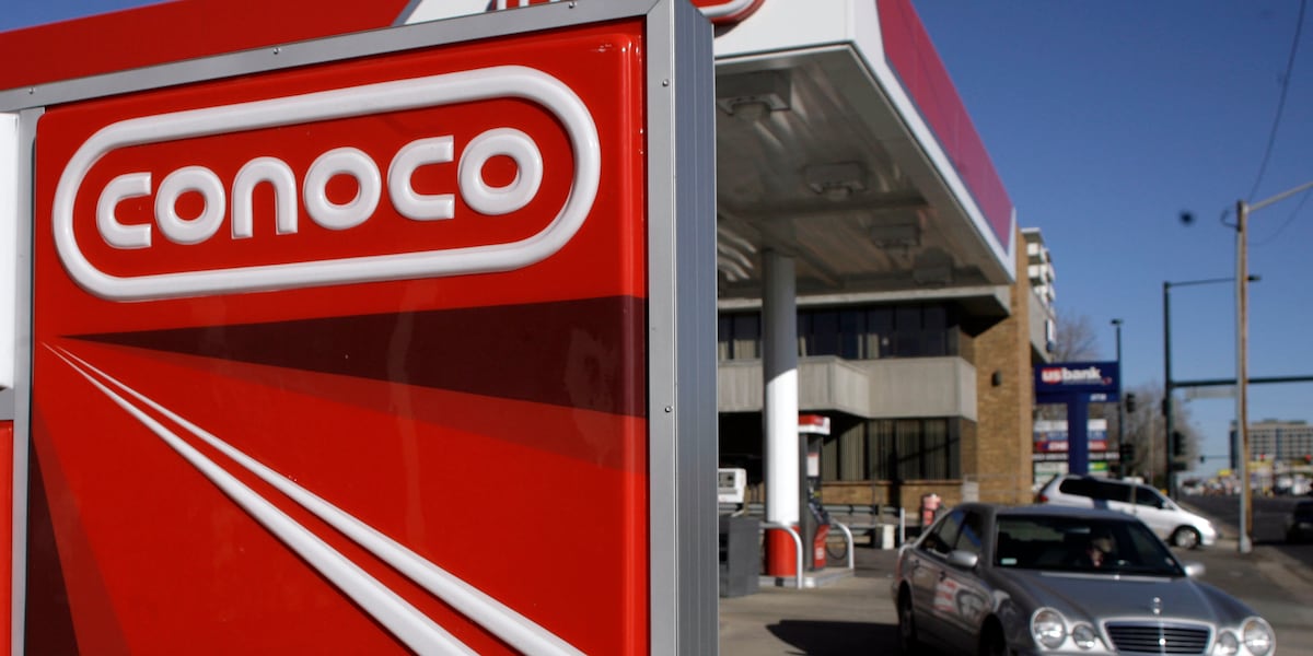 Conoco Sign High Rise ConocoPhillips buying Marathon Oil for $17.1 billion in all-stock deal ...