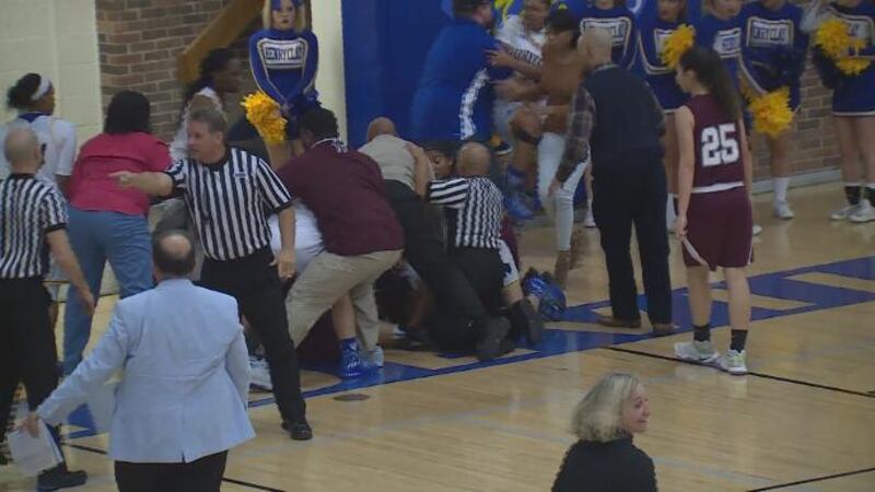 Girls' high school basketball game ends early after fight on court